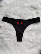Load image into Gallery viewer, Eat me design red text on black thong
