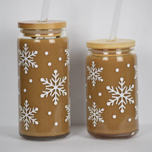 Load image into Gallery viewer, Two glass cans with bamboo lids and glass straws. Decorating the cans are white snowflakes and small white dots of snow.
