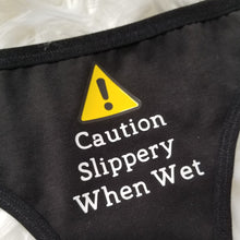 Load image into Gallery viewer, Close up of Caution Slippery When Wet Design
