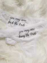 Load image into Gallery viewer, You may now bang the bride, you may now fuck the bride designs black text on white thong
