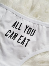 Load image into Gallery viewer, close up of all you can eat design black text on white thong
