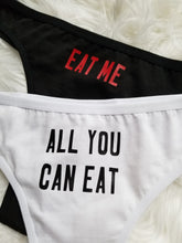 Load image into Gallery viewer, Eat me design red text on black thong, All you can eat design black text on white thong

