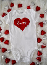 Load image into Gallery viewer, Valentine&#39;s Day Baby Bodysuit. White bodysuit with solid red heart with child&#39;s name in the middle.
