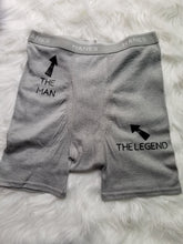 Load image into Gallery viewer, Grey boxer briefs with text &quot;the man&quot; and an arrow pointing up. Other text says &quot;the legend&quot; with an arrow pointing toward the crotch.
